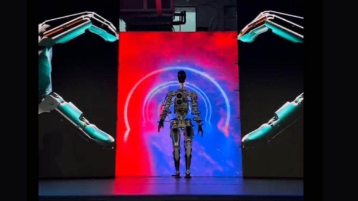 https://img.punjabijagran.com/punjabi/Tesla Humanoid Robot: ਐਲਨ ਮਸਕ ਨੇ ਟੇਸਲਾ ਦਾ ਹਿਊਮਨਾਈਡ ਰੋਬੋਟ 'ਓਪਟੀਮਸ' ਕੀਤਾ ਪੇਸ਼, ਅਜੇ ਪੂਰੀ ਤਰ੍ਹਾਂ  ਨਹੀਂ ਹੈ ਤਿਆਰ