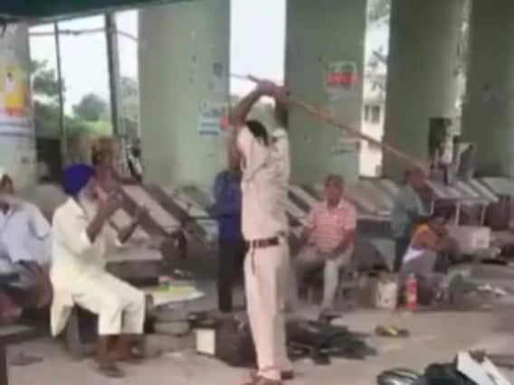 Punjab Shameful act of policeman in Patiala baton charge on an old man  Sukhbir Badal reacted