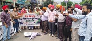 ਐੱਨਐੱਚਐੱਮ ਨੇ ਮੁੱਖ ਮੰਤਰੀ, ਸਿਹਤ ਮੰਤਰੀ ਤੇ ਵਿੱਤ ਮੰਤਰੀ ਦੇ ਪੁਤਲੇ ਫੂਕੇ